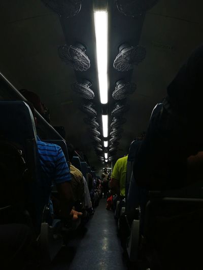 Rear view of people in bus