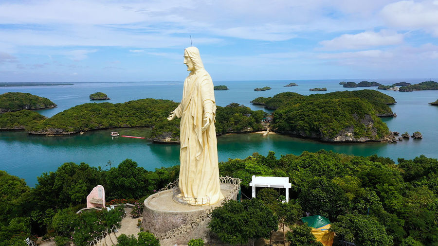 Sculpture of jesus christ on an island located in a hundred islands national park, pangasinan