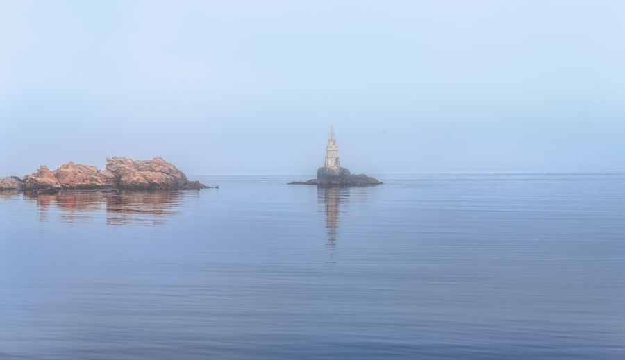 The lighthouse in the fog 