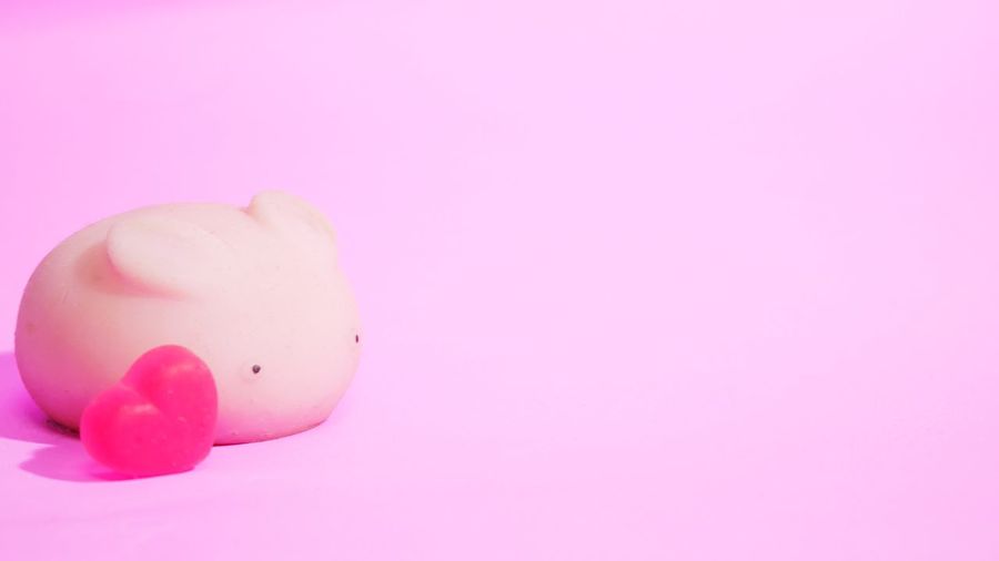 Close-up of toy against pink background