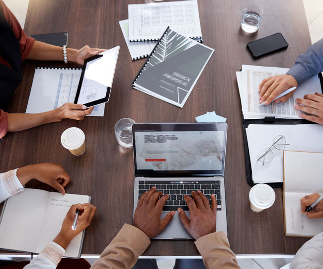 High angle view of business colleagues working in office