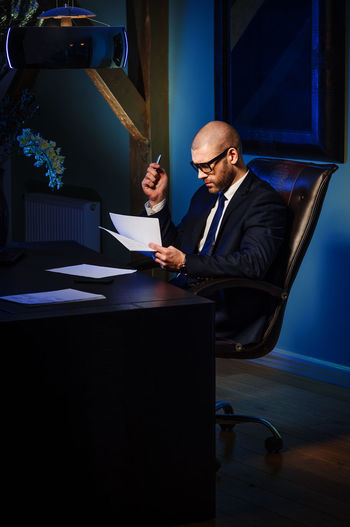 Businessman working at desk in office