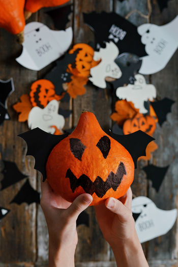 Cropped hand of person holding jigsaw piece