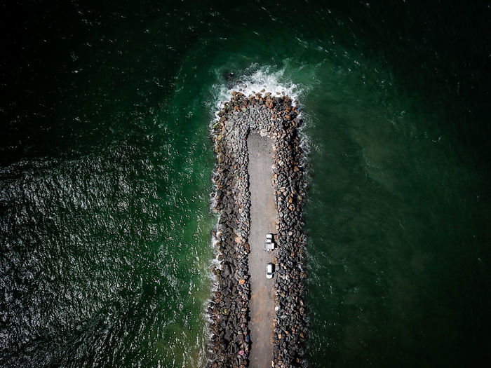 High angle view of boat against sea