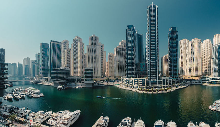 Dubai city in the uae. dubai marina. modern buildings in city against sky