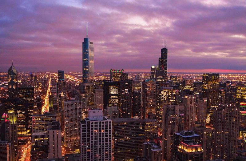 City lit up at sunset
