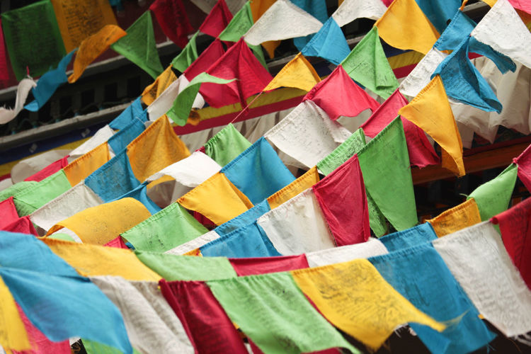 Full frame shot of colorful textiles hanging on ropes