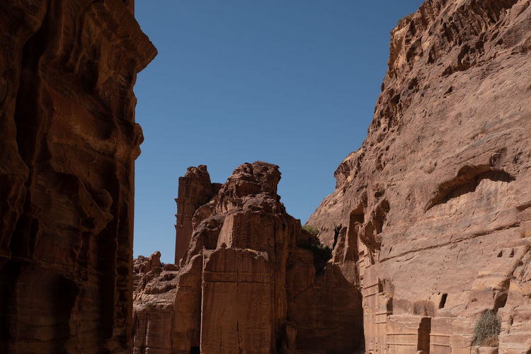 Low angle view of old ruins against clear sky