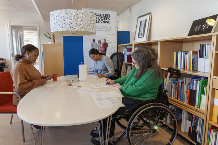 Disabled woman working in office