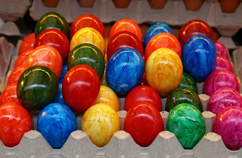 Colorful easter eggs in carton