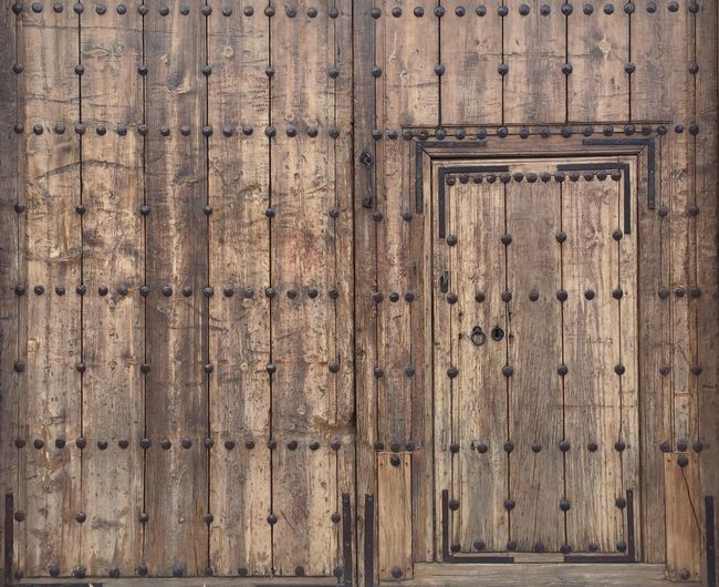 Full frame shot of closed brown door