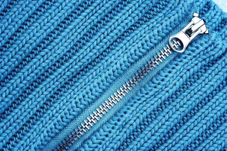 Full frame shot of sweater with zipper