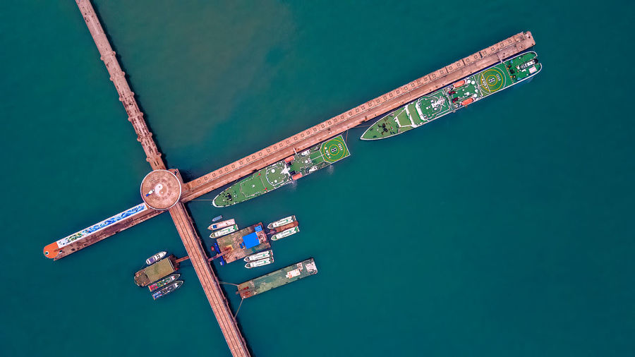 Vessels moored at the cross-shaped pier