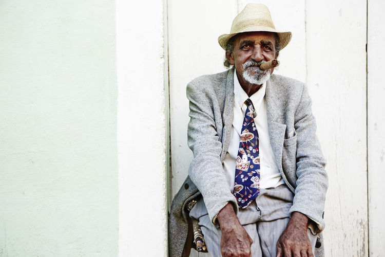 Old man smoking cigar