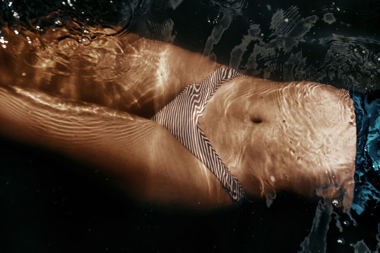 High angle view of man and woman in water