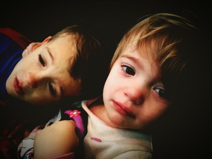 Close-up of sad siblings