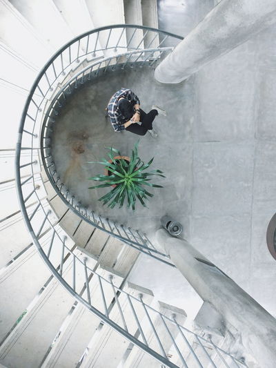 High angle view of people standing on steps