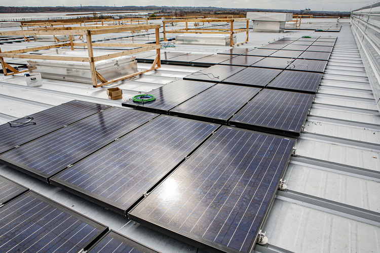 Commercial solar panel installation on roof