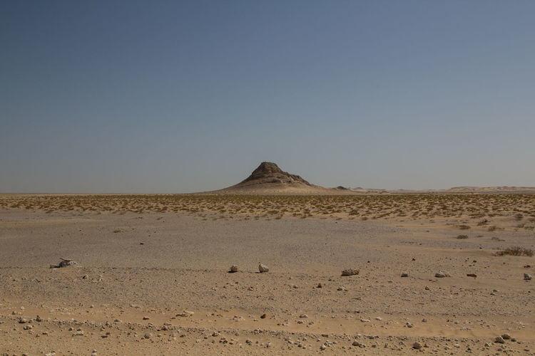 View of desert against clear sky
