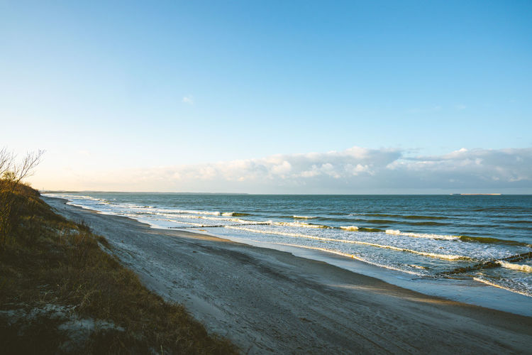 Scenic view of beach against sky