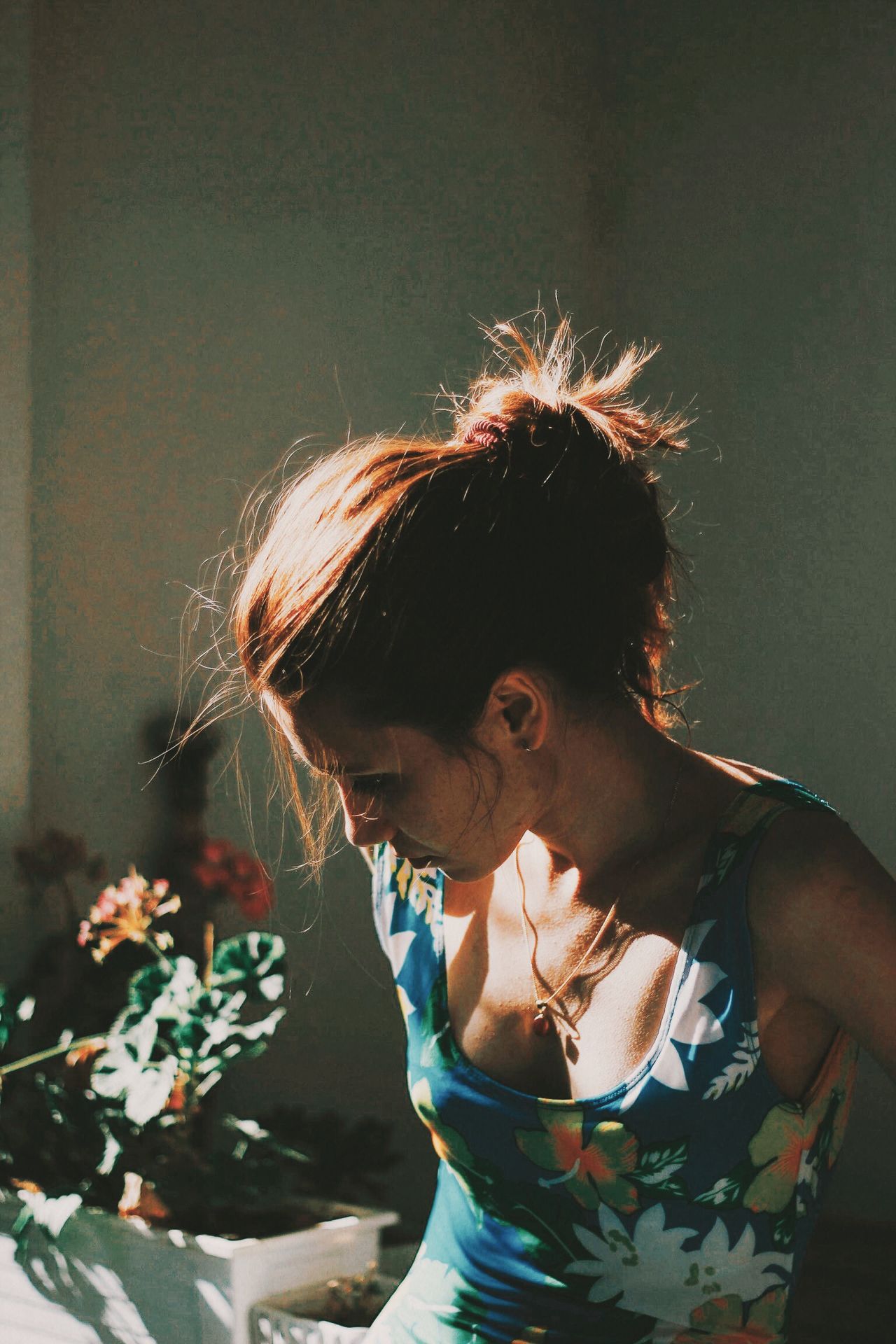 Young woman sitting at home