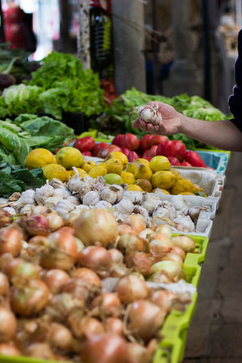 Close-up of fruits and vegetables for sale at market stall