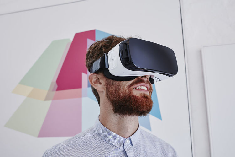Man wearing virtual reality glasses
