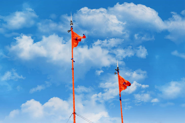 Low angle view of flag against sky