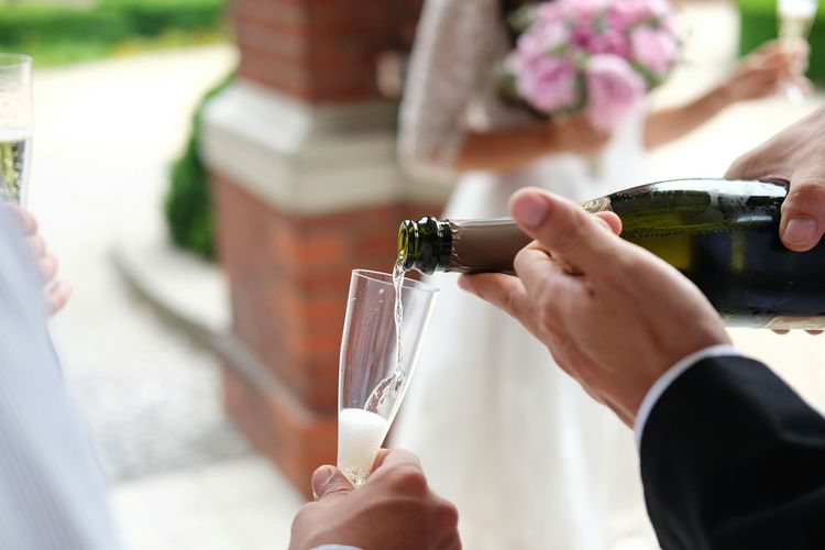 Close-up of hand holding drink
