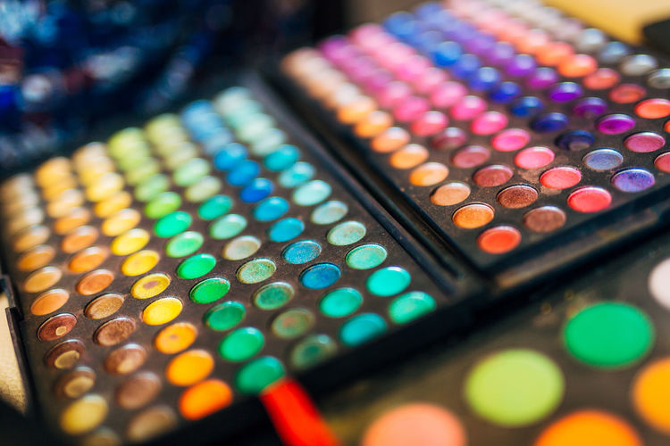Close-up of multi colored make-up products