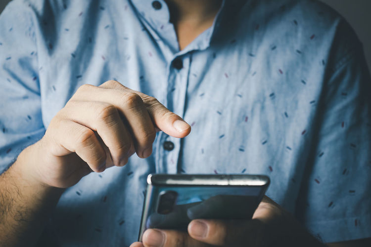 Men are using smartphones for social media and online marketing including working from home