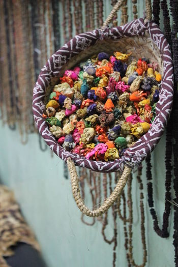 Colorful potpourri in hanging wicker basket