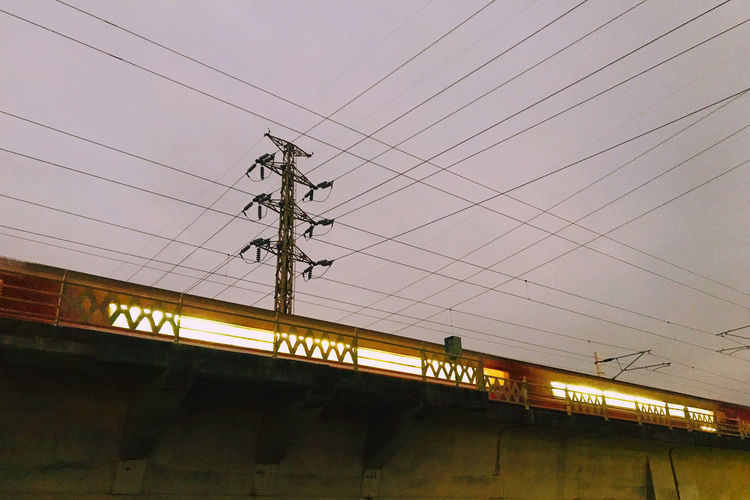 Low angle view of train against sky