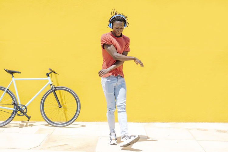 Black guy dancing on street