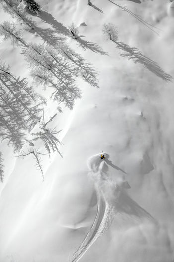 Aerial image of a skier in the backcountry of the kootenays, kaslo, b.c.