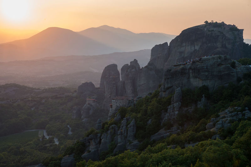 Landscape of meteora mountains, greece, on a summer day at sunset
