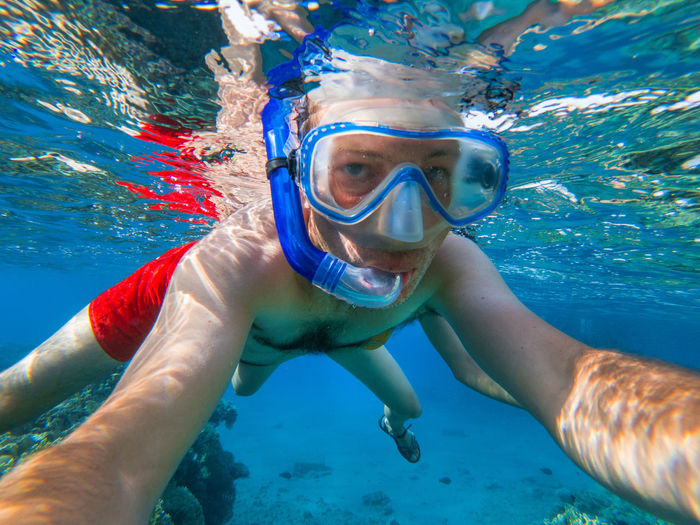 Portrait of man snorkeling in sea