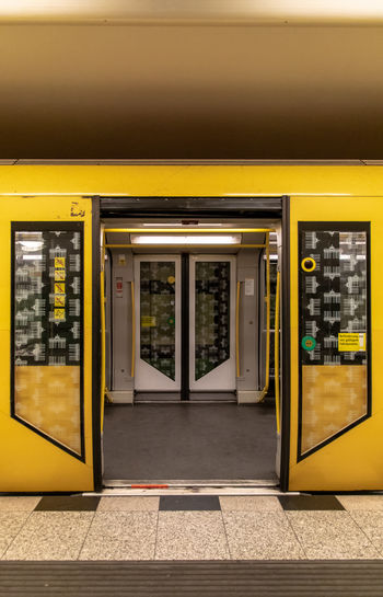 Yellow train at railroad station