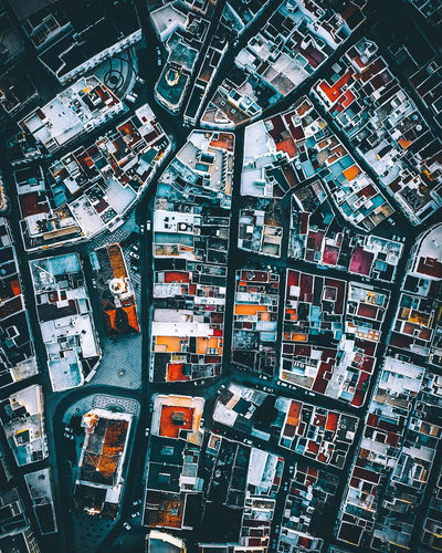 High angle view of street and buildings in city