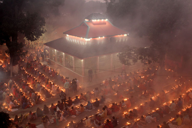 High angle view of crowd at temple at night