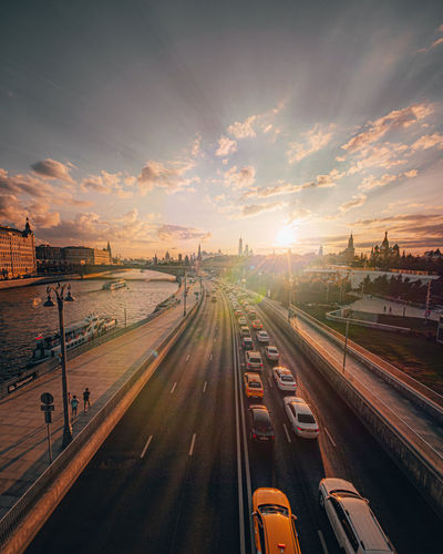 High angle view of traffic on road against sky during sunset