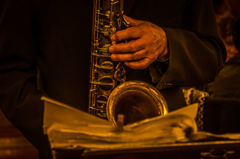 Close-up of man playing trumpet