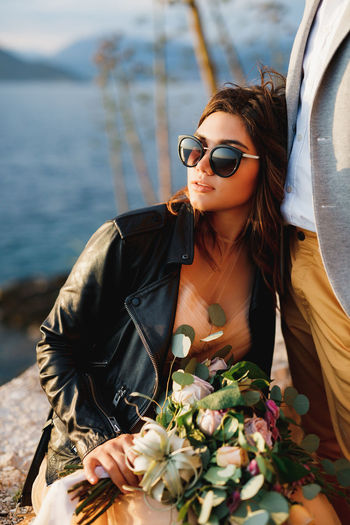 Young woman wearing sunglasses outdoors
