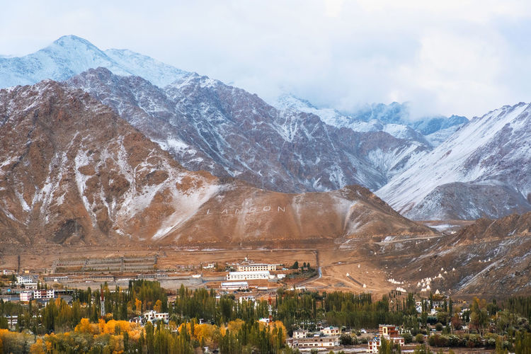 Scenic view of snowcapped mountains against sky