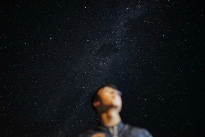Low angle view of stars against sky at night