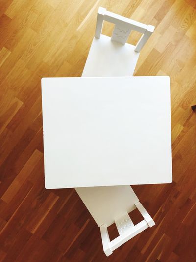 High angle view of paper on table