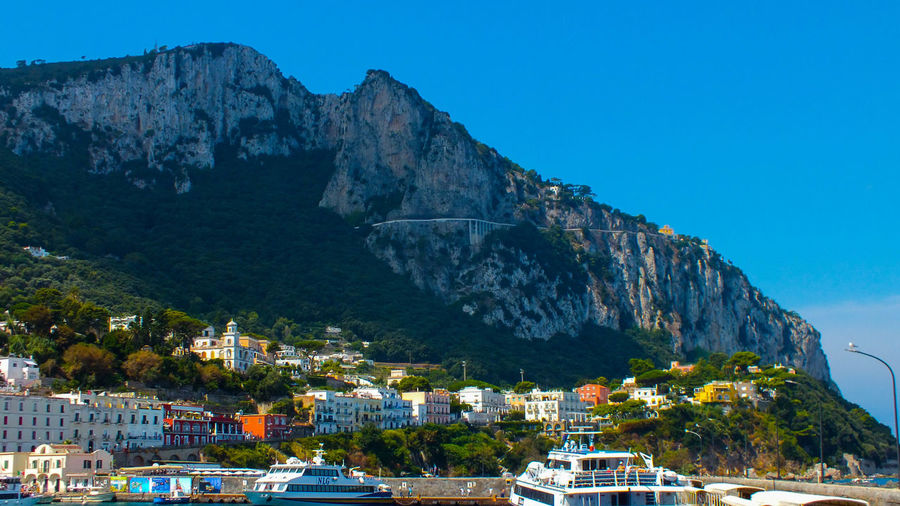 Sunny and colorful panorama harbor on island of capri in italy