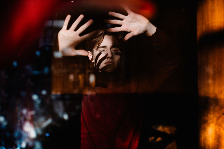 Adult Adults Only Alcohol Depression - Sadness Hand Raised Happy Hour Headshot Human Body Part Indoors Night Nightlife One Person Only Men People Young Adult