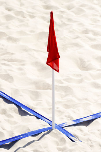 High angle view of flag on beach