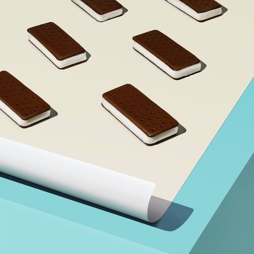 Close up of ice cream sandwiches on sheet of paper
